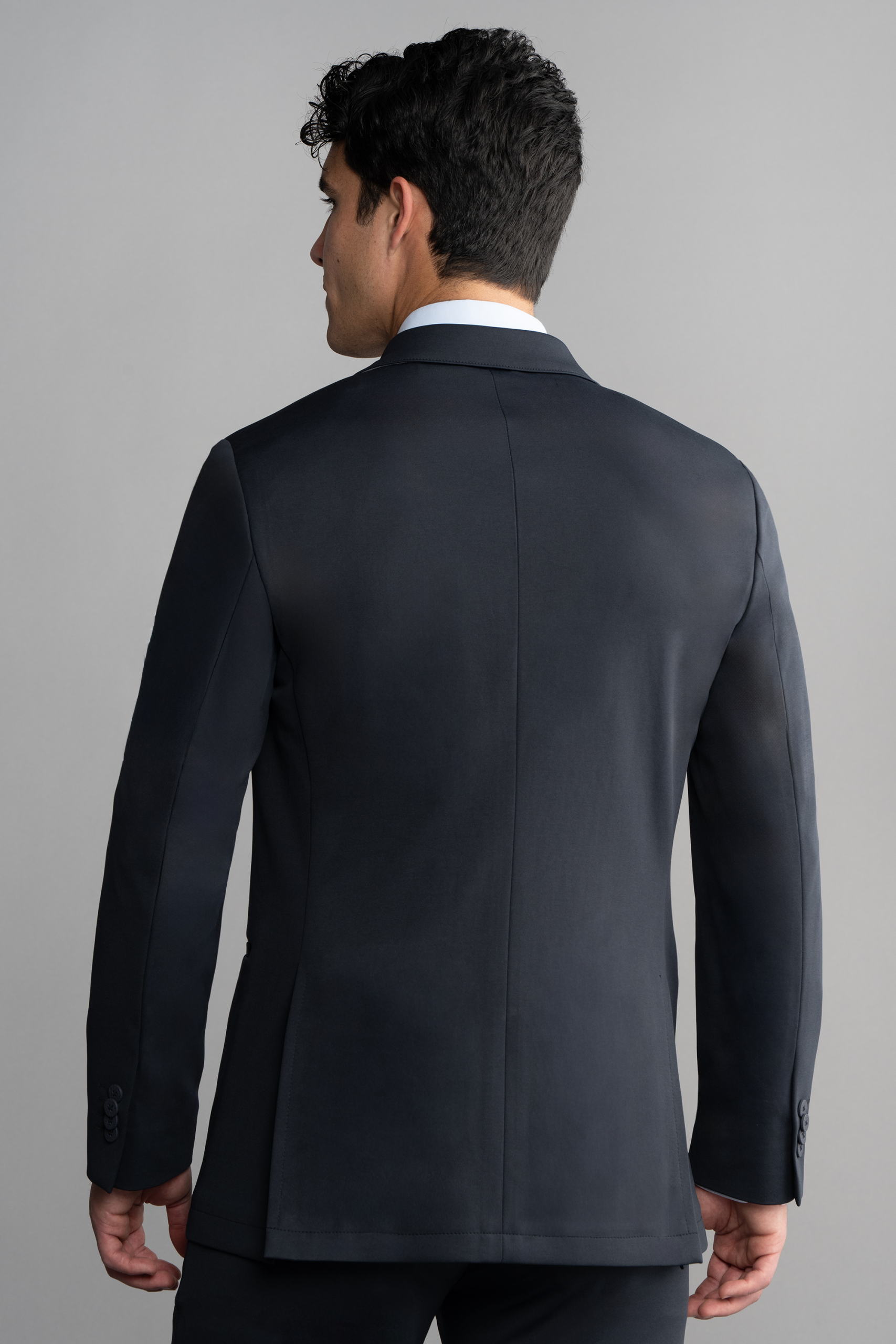 Circular-Knit-Black-Blazer-Back-25.1_06f1e2a0-2d7b-4e5f-ab22-7d4f48c571dd.png