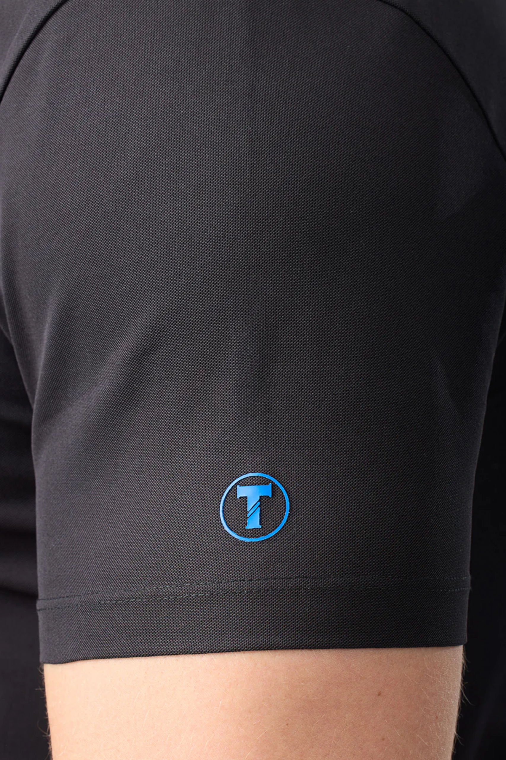 Slim-Fit-Pique-Polo-Solid-Black-Sleeve.png